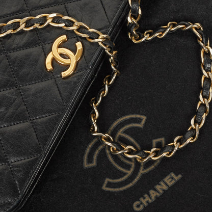 Chanel Classic Vollklappentasche aus schwarzem gestepptem Lammleder mit 24K vergoldeten Beschlägen