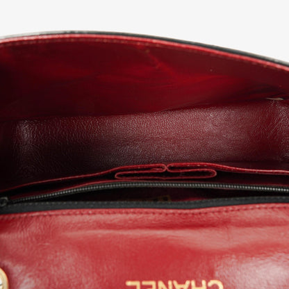 Chanel Vollklappentasche aus schwarzem gestepptem Leder mit 24K vergoldeten Beschlägen
