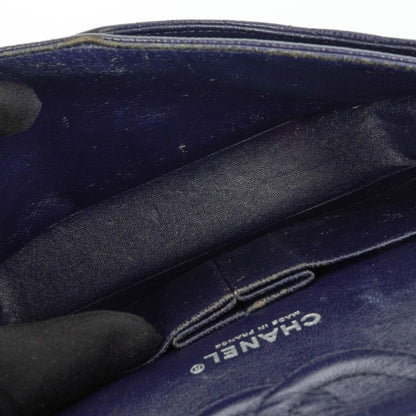 Chanel Klassische Medium Double Flap Tasche in Marineblau Gepolstertes Kaviarleder und Silberfarbene Beschläge