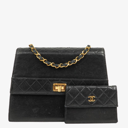 Chanel Classic Vintage Medium Trapeztasche aus schwarzem gestepptem Lammleder, 1989-1991