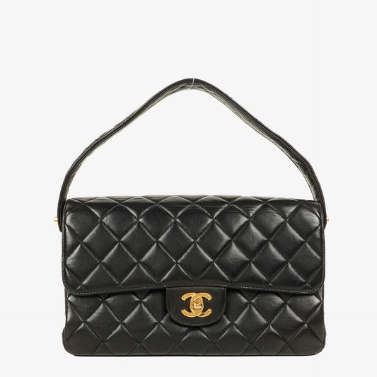Chanel Wendedesign Clutch aus schwarzem Lammleder mit 24K-vergoldeten Beschlägen