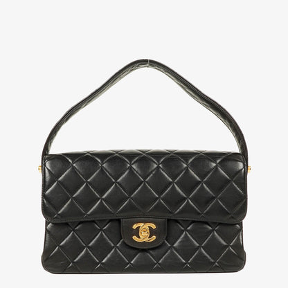 Chanel Wendedesign Clutch aus schwarzem Lammleder mit 24K-vergoldeten Beschlägen