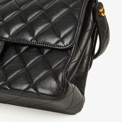 Chanel Wendedesign Clutch aus schwarzem Lammleder mit 24K-vergoldeten Beschlägen