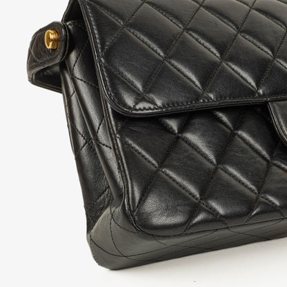 Chanel Wendedesign Clutch aus schwarzem Lammleder mit 24K-vergoldeten Beschlägen