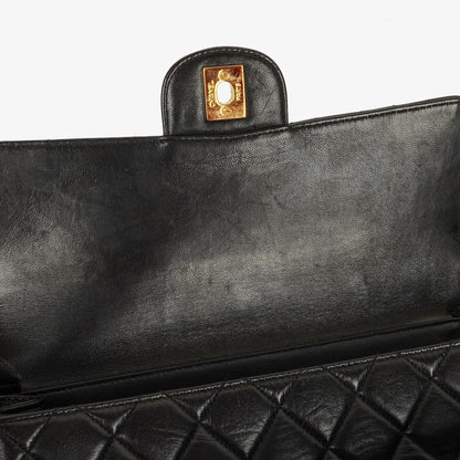 Chanel Wendedesign Clutch aus schwarzem Lammleder mit 24K-vergoldeten Beschlägen