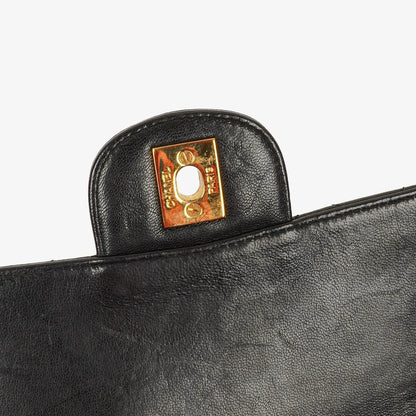 Chanel Wendedesign Clutch aus schwarzem Lammleder mit 24K-vergoldeten Beschlägen