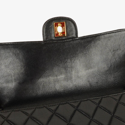 Chanel Wendedesign Clutch aus schwarzem Lammleder mit 24K-vergoldeten Beschlägen