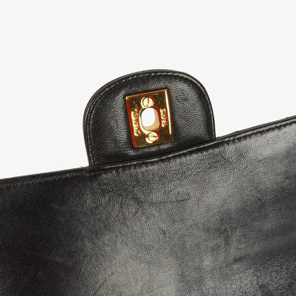 Chanel Wendedesign Clutch aus schwarzem Lammleder mit 24K-vergoldeten Beschlägen