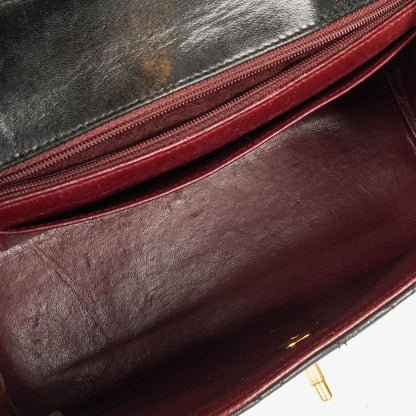 CHANEL Klappentasche aus schwarzem gestepptem Lammleder mit Ketten-Obergriff und 24K vergoldeten Beschlägen