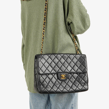 Chanel Jumbo Classic Single Flap Tasche aus schwarzem gestepptem Lammleder mit 24K vergoldeten Beschlägen
