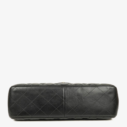 Chanel Jumbo Classic Single Flap Tasche aus schwarzem gestepptem Lammleder mit goldfarbenen Beschlägen