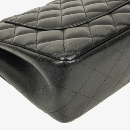 Chanel Jumbo Classic Single Flap Tasche aus schwarzem gestepptem Lammleder mit goldfarbenen Beschlägen