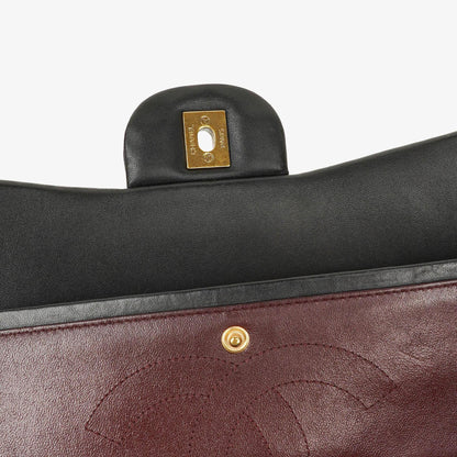 Chanel Jumbo Classic Single Flap Tasche aus schwarzem gestepptem Lammleder mit goldfarbenen Beschlägen
