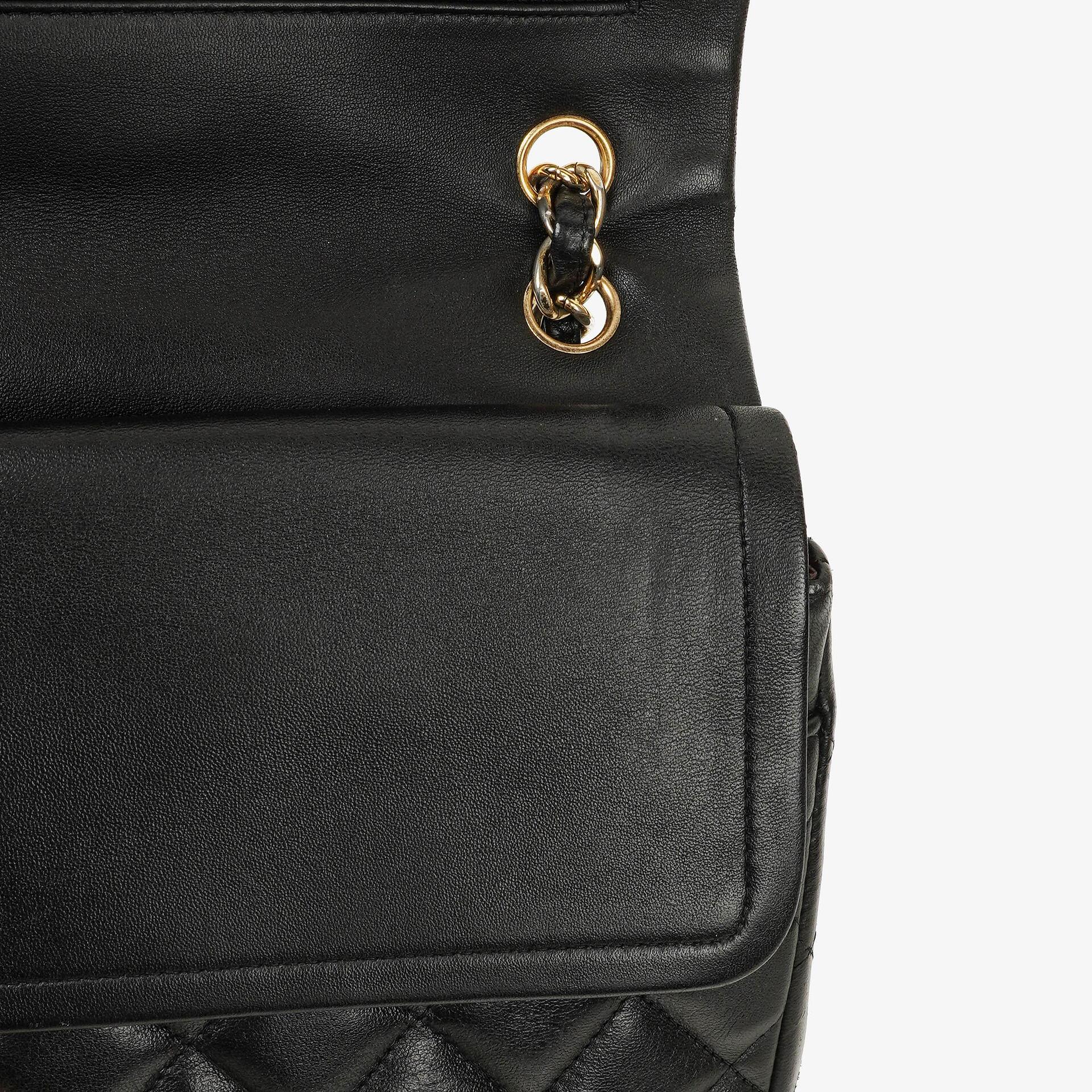 Chanel Jumbo Classic Single Flap Tasche aus schwarzem gestepptem Lammleder mit goldfarbenen Beschlägen