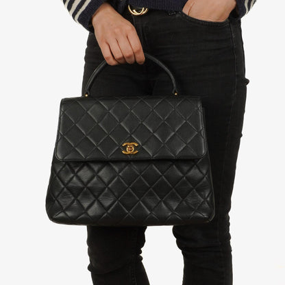 Chanel Kelly Schwarze Stepp-Caviar-Leder-Top-Handle-Tasche mit 24K vergoldeten Beschlägen, 1996-1997
