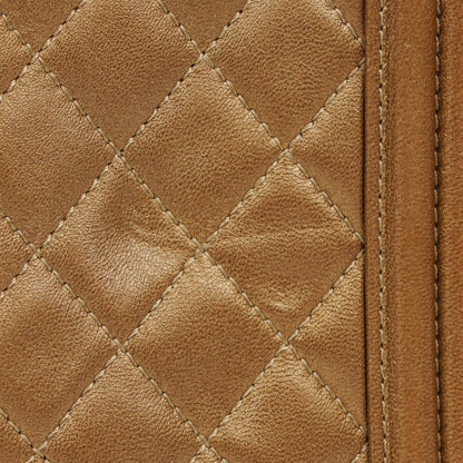 Chanel Große Boy gesteppte Flap Bag in Gold Metallic mit gealterten goldfarbenen Beschlägen