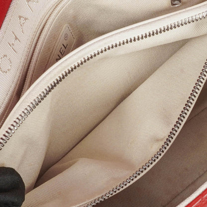 CHANEL Große Simply CC Rue Cambon Klappentasche aus rotem glänzendem Kalbsleder