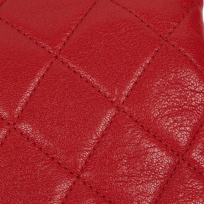 CHANEL Große Simply CC Rue Cambon Klappentasche aus rotem glänzendem Kalbsleder