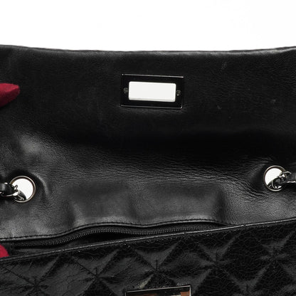 Chanel Mademoiselle Klappentasche aus glasiertem Crackled-Kalbsleder mit silberfarbenen Beschlägen
