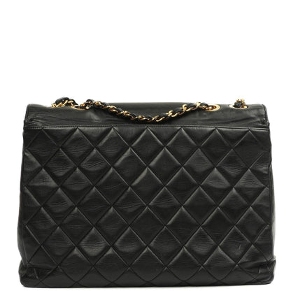 Chanel Classic Maxi Jumbo Single Flap Bag aus schwarzem gestepptem Lammleder mit 24K vergoldeten Beschlägen