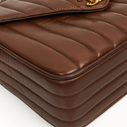 Chanel Medium Kamera Quaste Braune Vertikale Gequiltete Lammleder CC Klapptasche 24K Goldbeschläge, 1994-1996
