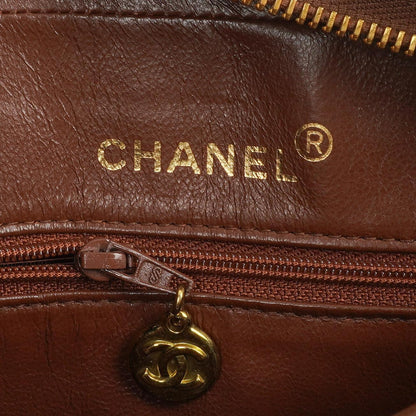 Chanel Medium Kamera Quaste Braune Vertikale Gequiltete Lammleder CC Klapptasche 24K Goldbeschläge, 1994-1996