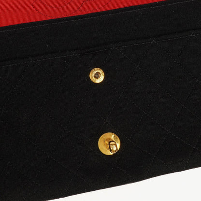 Chanel Mittelgroße Klassische Double Flap Tasche aus schwarzem gestepptem Jersey mit 24K vergoldeter Hardware
