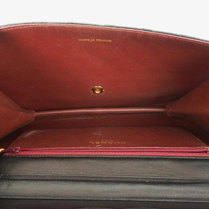Chanel Medium Classic Single Flap Tasche aus schwarzem gestepptem Lammleder mit goldfarbenen Beschlägen