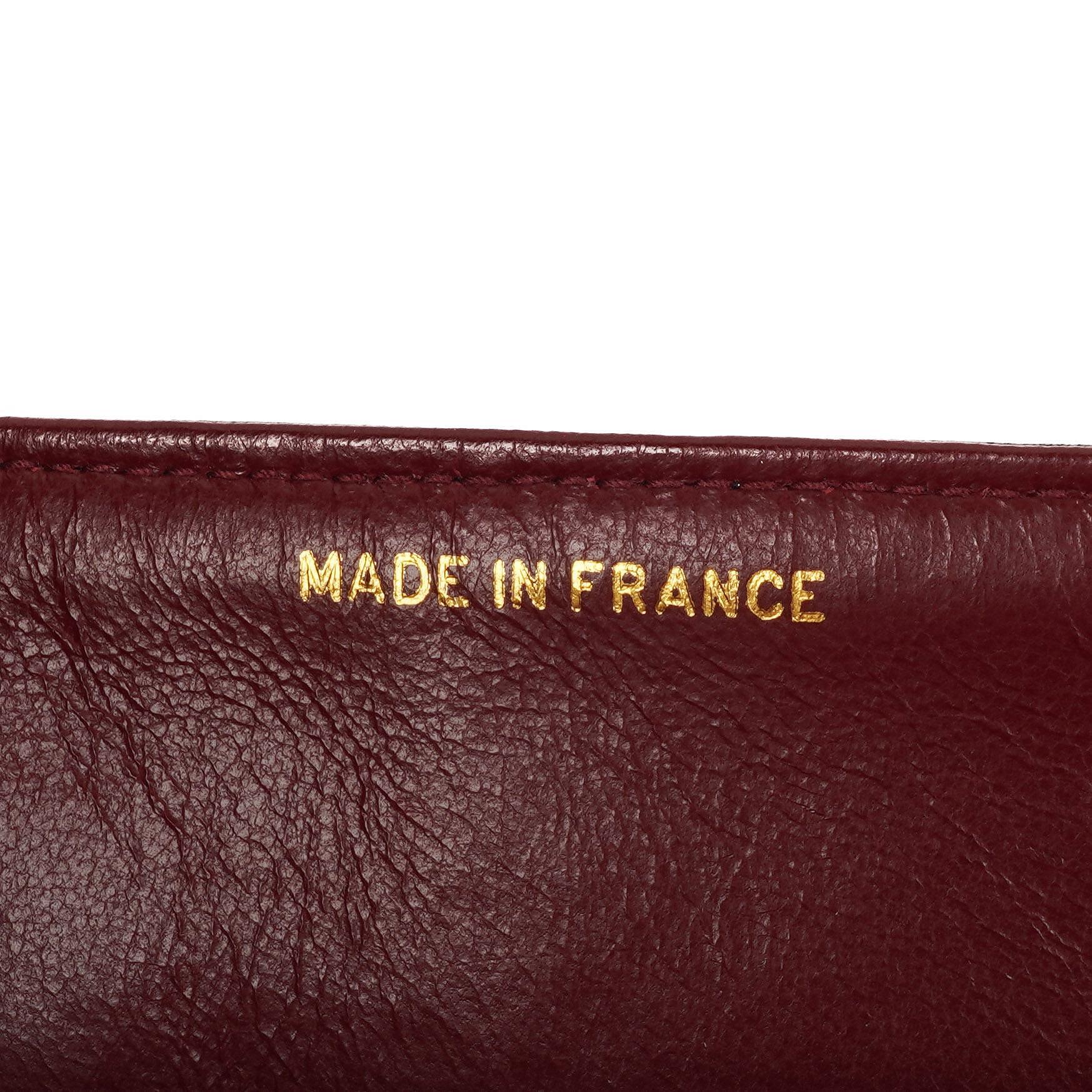 Chanel Mittelgroße Klassische Vintage Doppelklappen Tasche Schwarze gesteppte Lammleder mit 24K vergoldeten Beschlägen Sehr gut