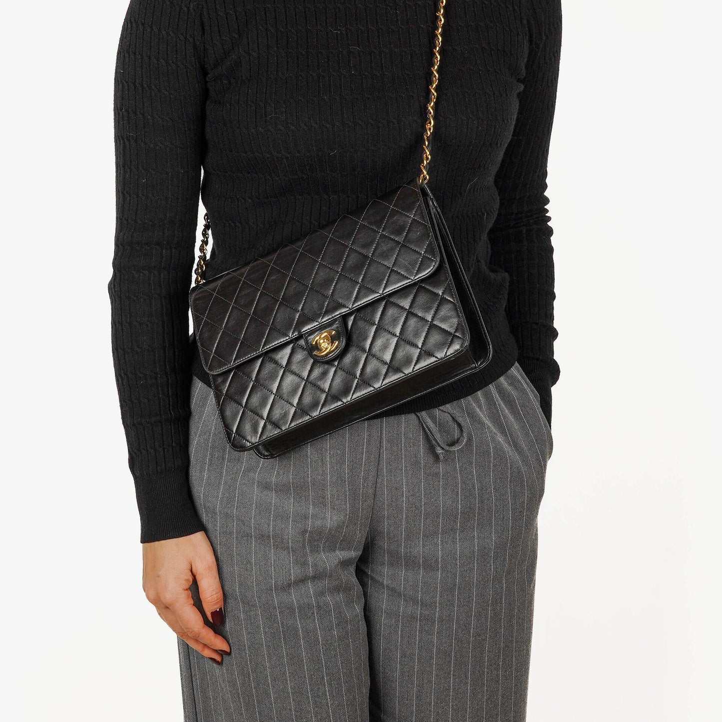 Chanel Medium Single Flap Bag aus schwarzem gestepptem Lammleder mit goldfarbenen Beschlägen