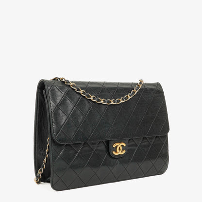 Chanel Medium Classic Single Flap Bag aus schwarzem gestepptem Lammleder mit 24K vergoldeter Hardware
