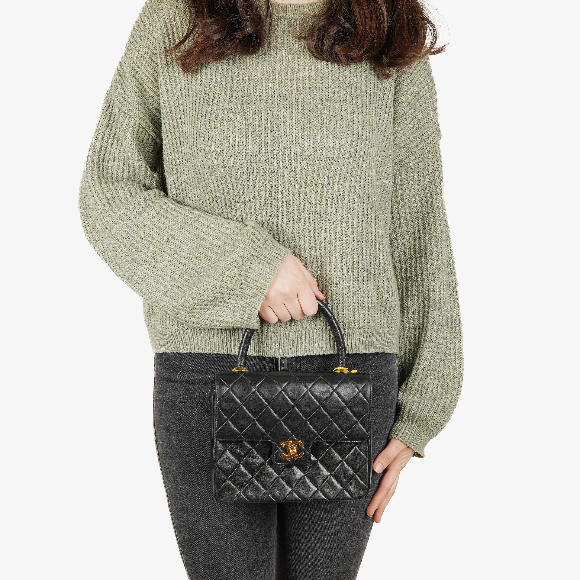 Chanel Mini Classic Kelly Vintage aus schwarzem gestepptem Lammleder mit 24K vergoldeten Beschlägen