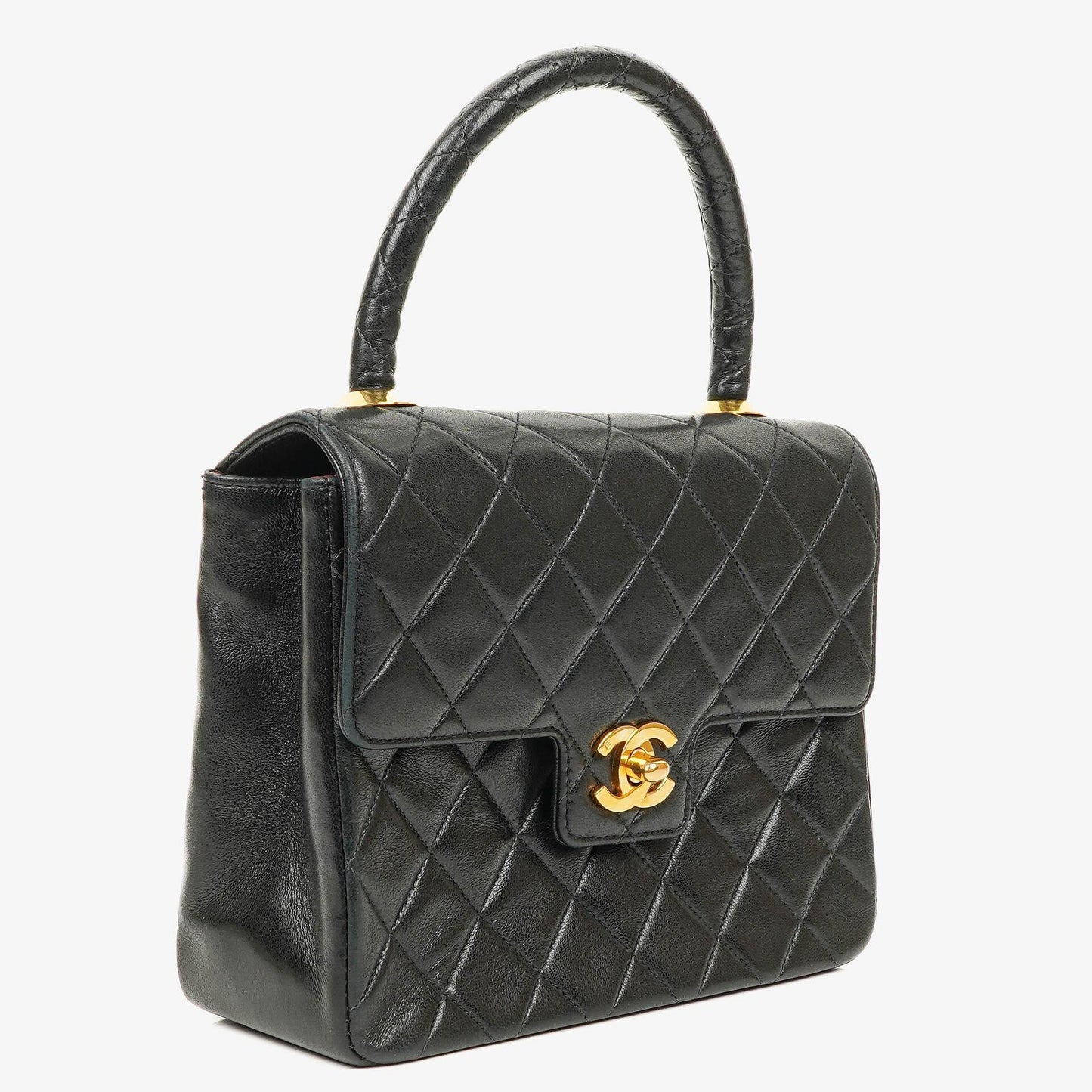 Chanel Mini Classic Kelly Vintage aus schwarzem gestepptem Lammleder mit 24K vergoldeten Beschlägen