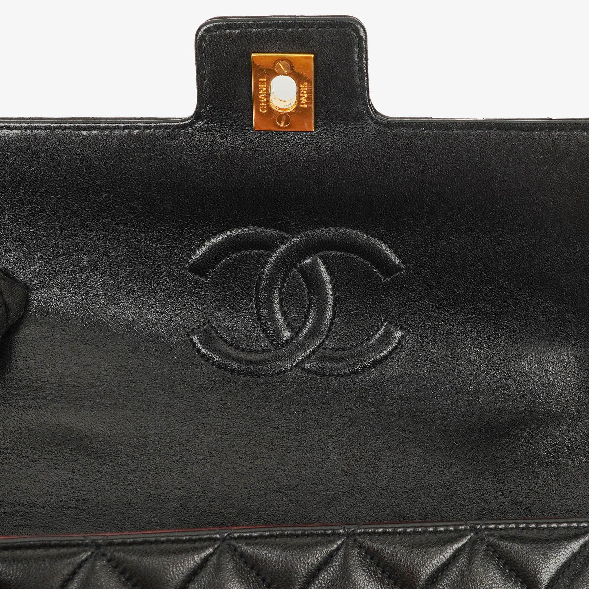 Chanel Mini Classic Kelly Vintage aus schwarzem gestepptem Lammleder mit 24K vergoldeten Beschlägen