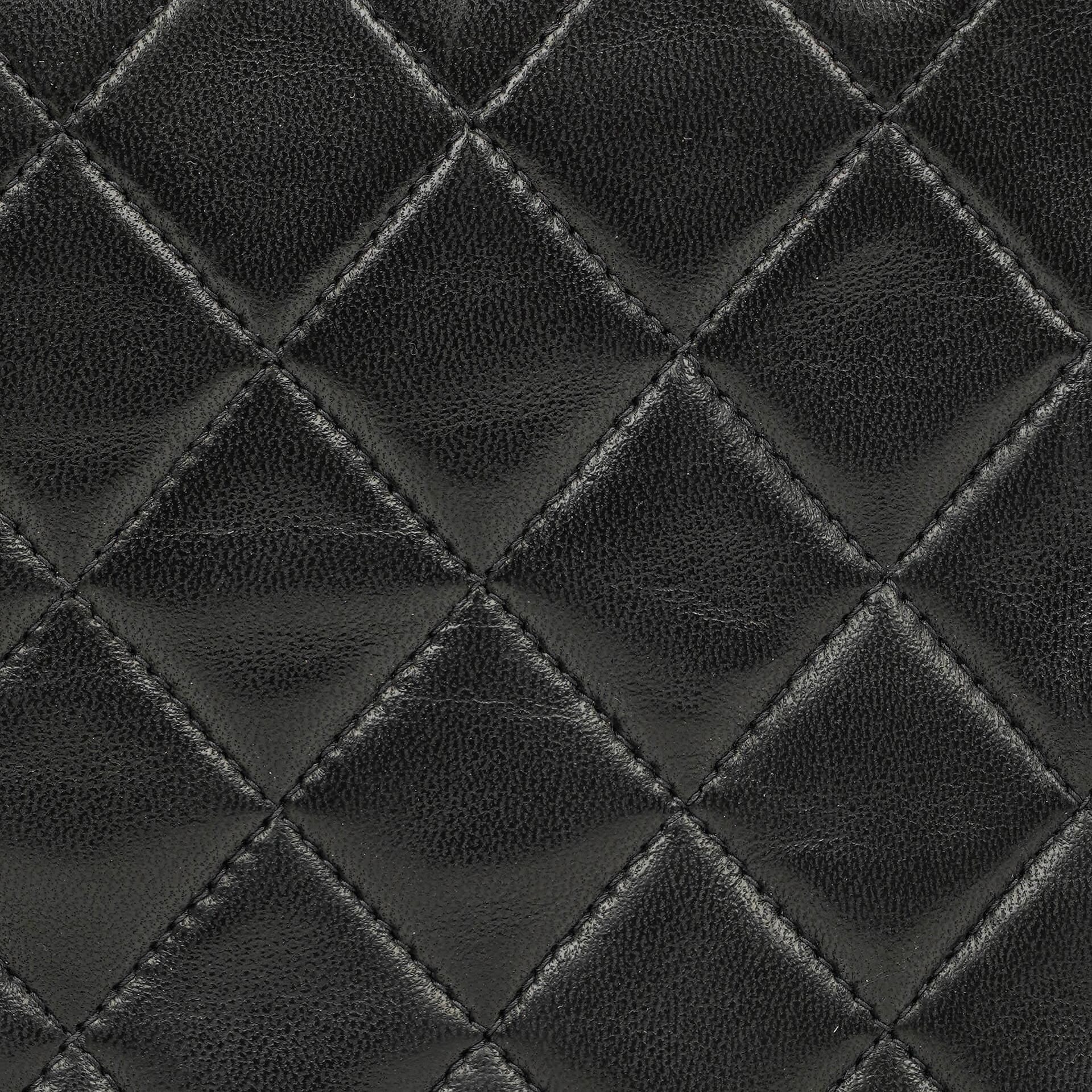 Chanel Mini Classic Kelly Vintage aus schwarzem gestepptem Lammleder mit 24K vergoldeten Beschlägen