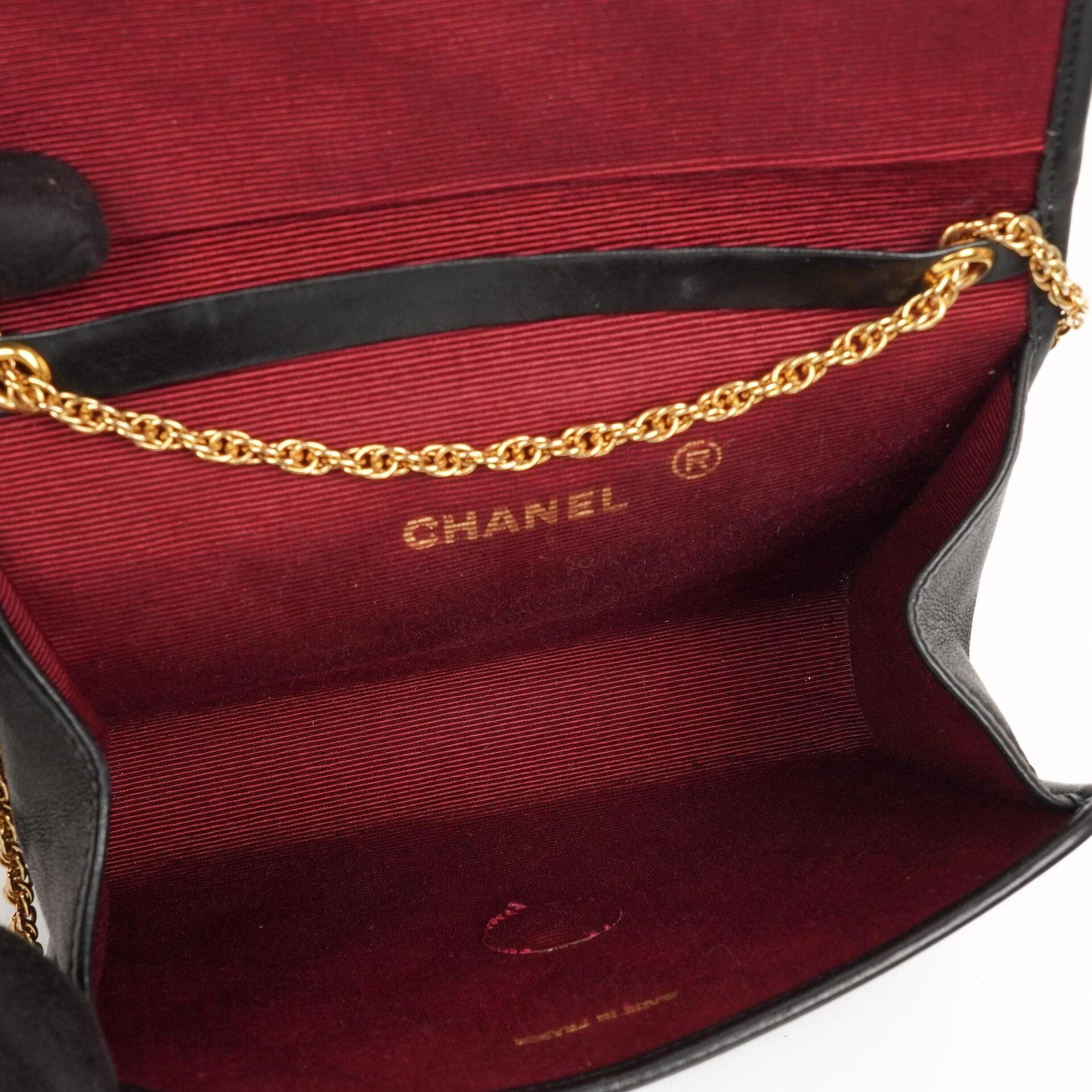Chanel Mini Klapptasche Schwarze gesteppte Lammleder mit 24K vergoldeten Beschlägen Gut