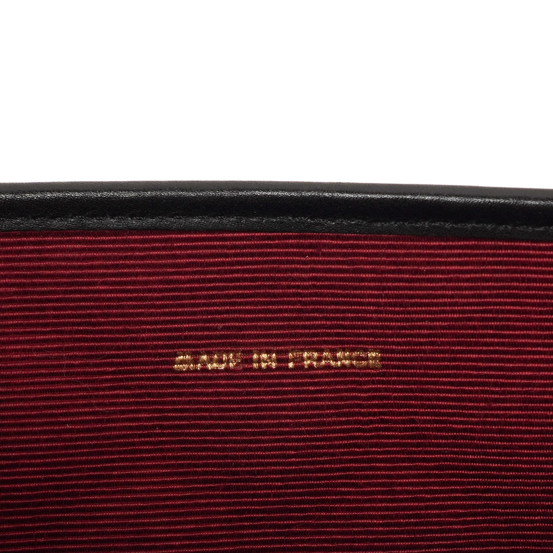 Chanel Mini Klapptasche Schwarze gesteppte Lammleder mit 24K vergoldeten Beschlägen Gut