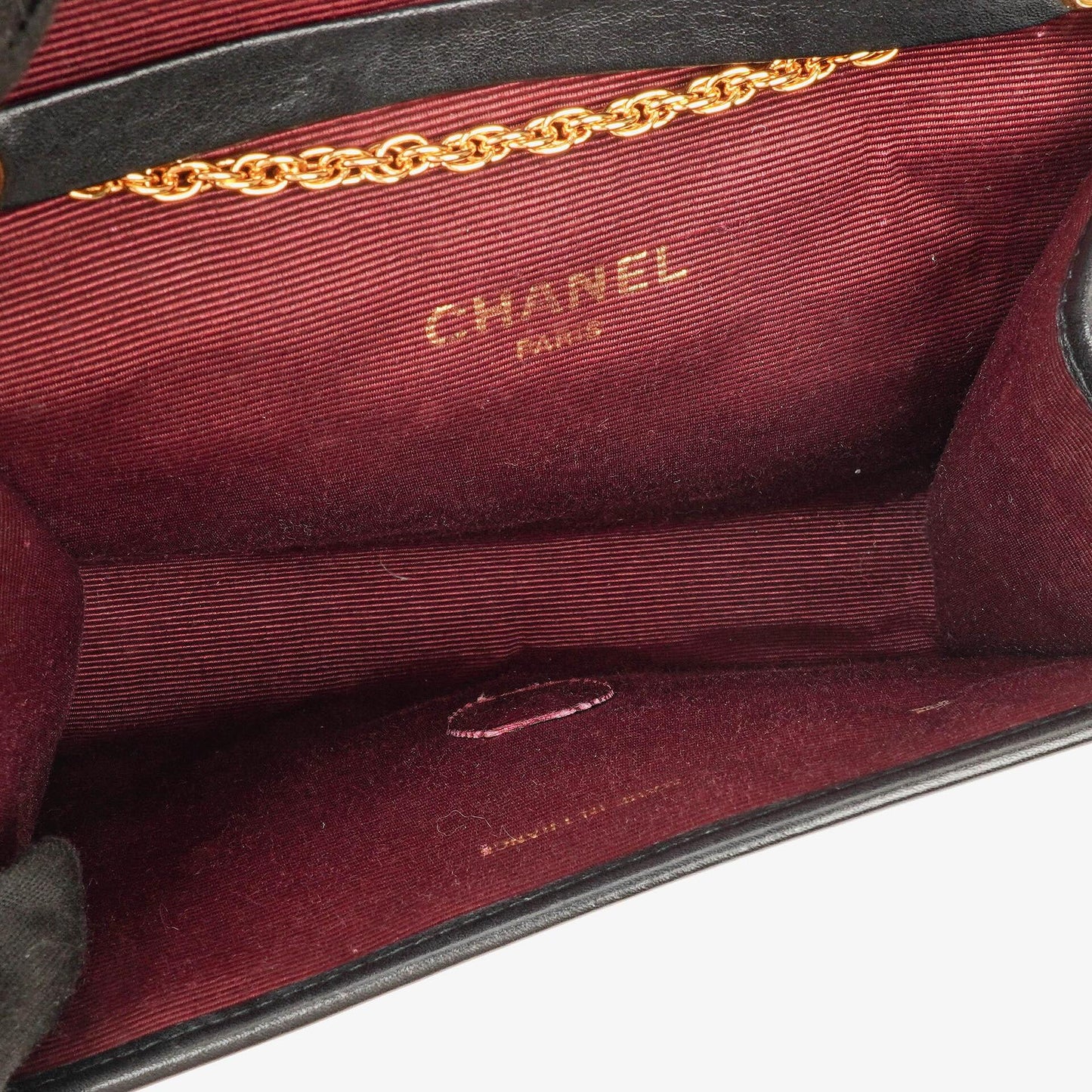 Chanel Mini Flap Bag aus schwarzem gestepptem Lammleder mit 24K-vergoldeten Beschlägen