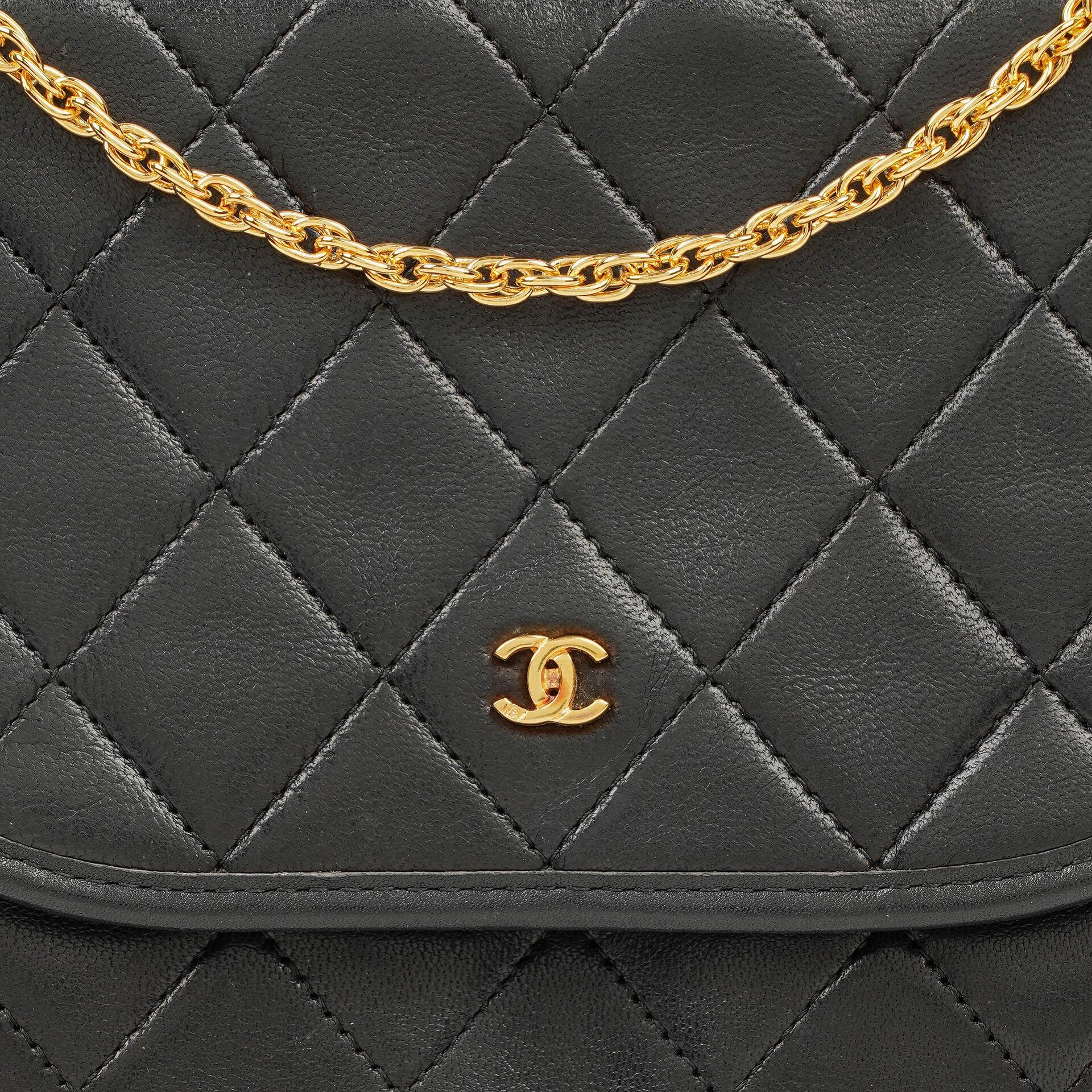 Chanel Mini Flap Bag aus schwarzem gestepptem Lammleder mit 24K-vergoldeten Beschlägen