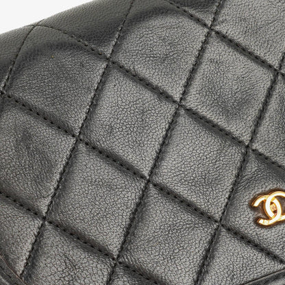 Chanel Mini Flap Bag aus schwarzem gestepptem Lammleder mit 24K-vergoldeten Beschlägen