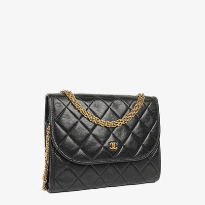 Chanel Mini Flap Bag aus schwarzem gestepptem Lammleder mit 24K vergoldeter Hardware