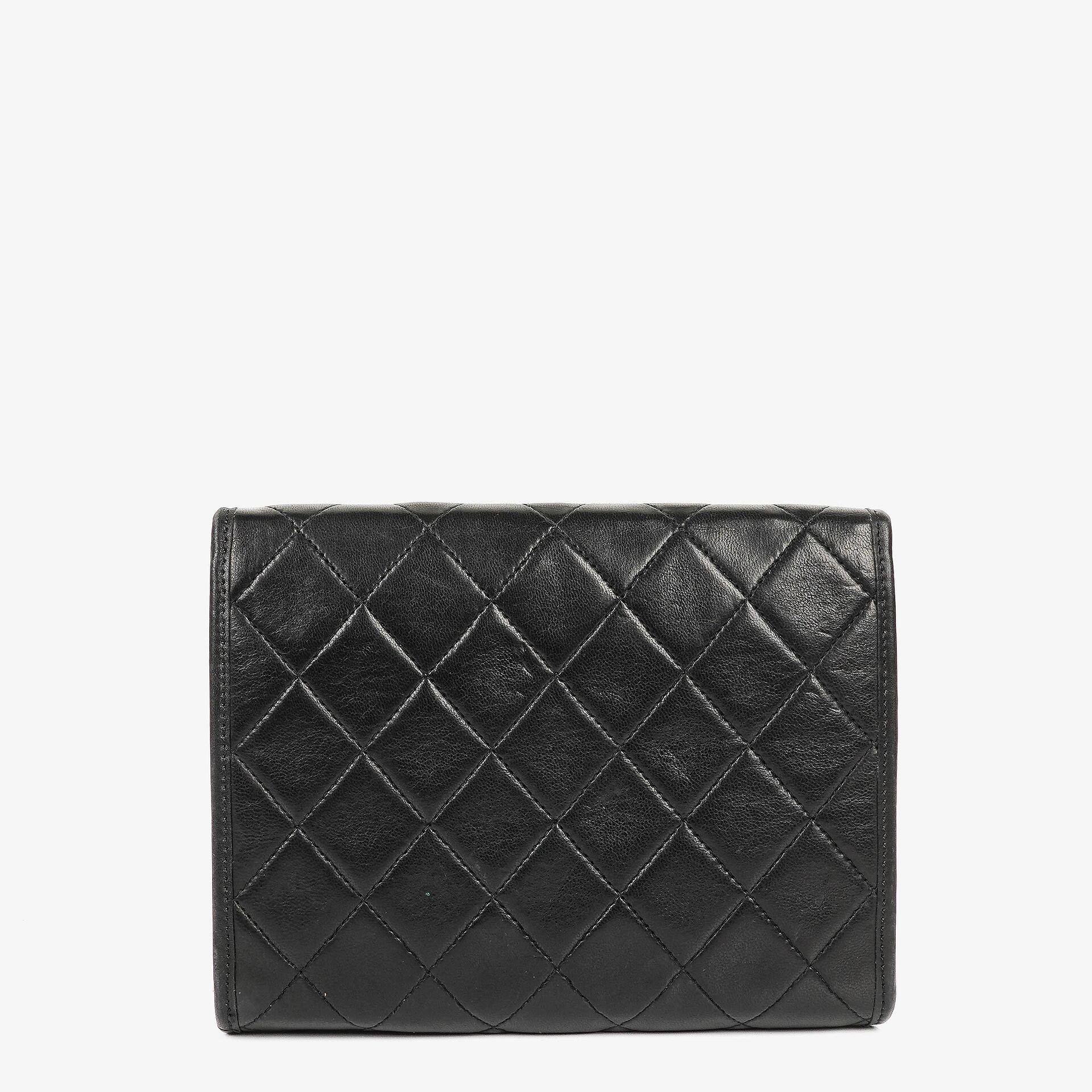 Chanel Mini Flap Bag aus schwarzem gestepptem Lammleder mit 24K vergoldeter Hardware