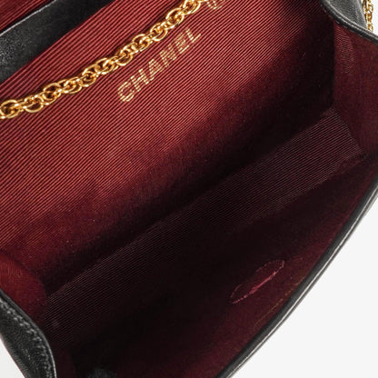 Chanel Mini Flap Bag aus schwarzem gestepptem Lammleder mit 24K vergoldeter Hardware