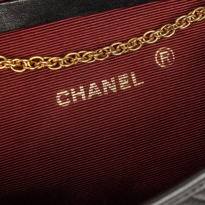 Chanel Mini Flap Bag aus schwarzem gestepptem Lammleder mit 24K vergoldeter Hardware