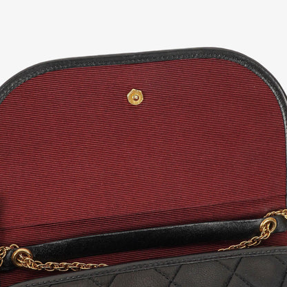 Chanel Mini Flap Bag aus schwarzem gestepptem Lammleder mit 24K vergoldeter Hardware