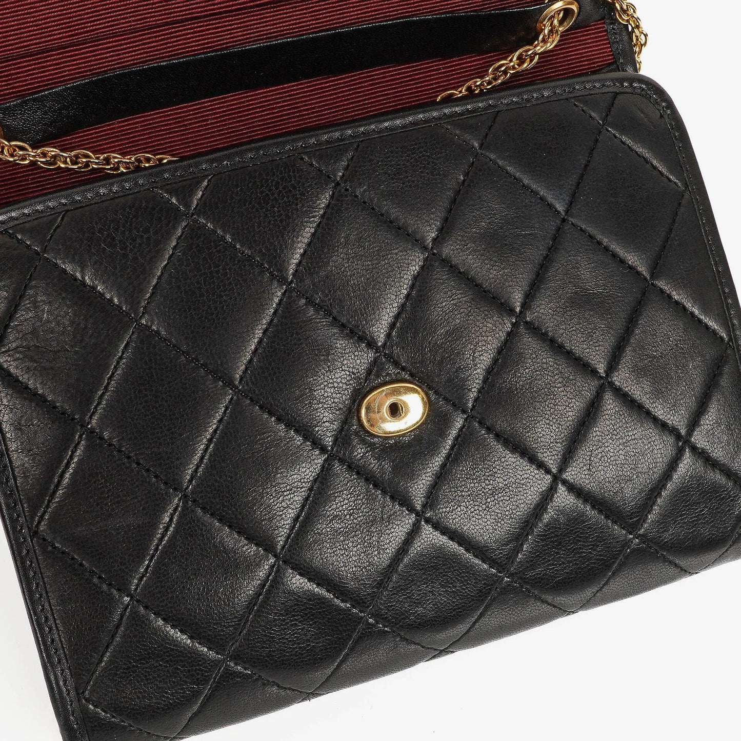 Chanel Mini Flap Bag aus schwarzem gestepptem Lammleder mit 24K vergoldeter Hardware