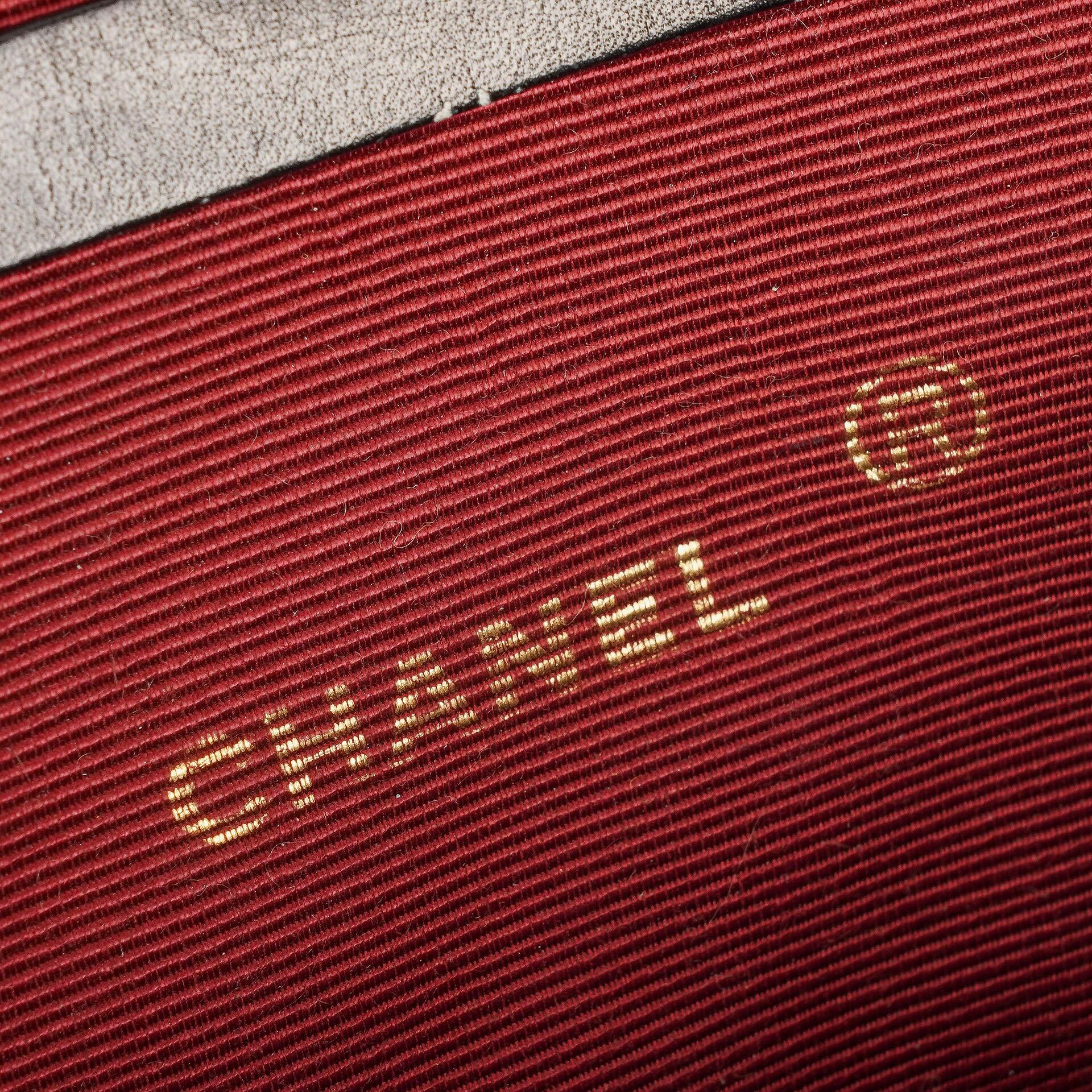 Chanel Mini Flap Tasche aus schwarzem gestepptem Lammleder mit 24K vergoldeter Hardware