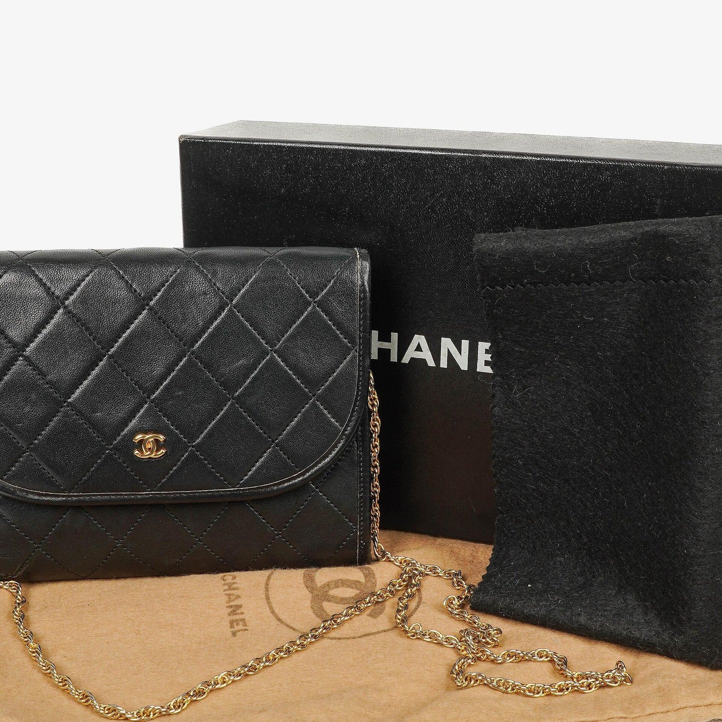 Chanel Mini Flap Tasche aus schwarzem gestepptem Lammleder mit 24K vergoldeter Hardware