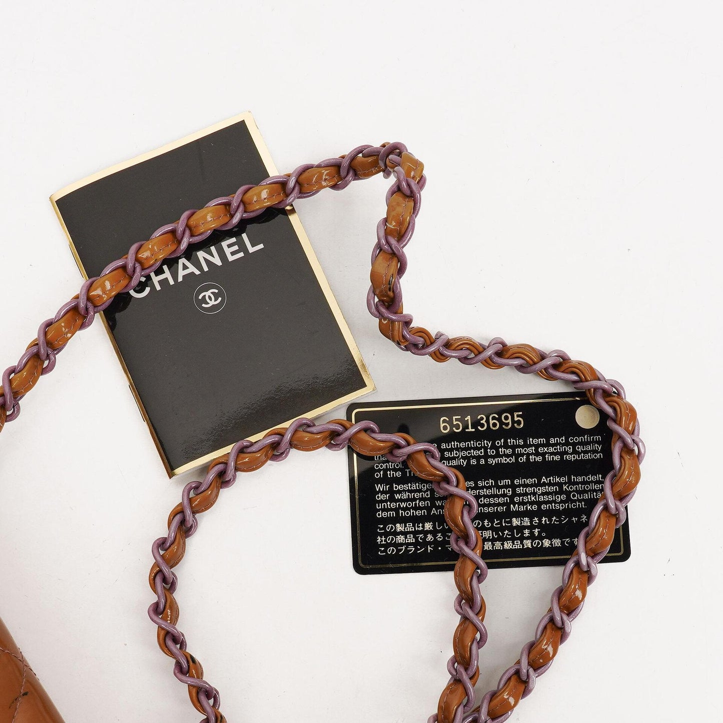Chanel Mini Rectangular Flap Tasche aus gestepptem Lackleder