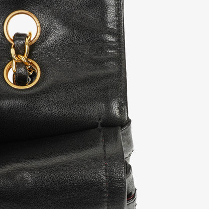 Chanel Paris Classic Medium Double Flap Bag aus schwarzem gestepptem Lammleder mit gold- und silberfarbener Hardware